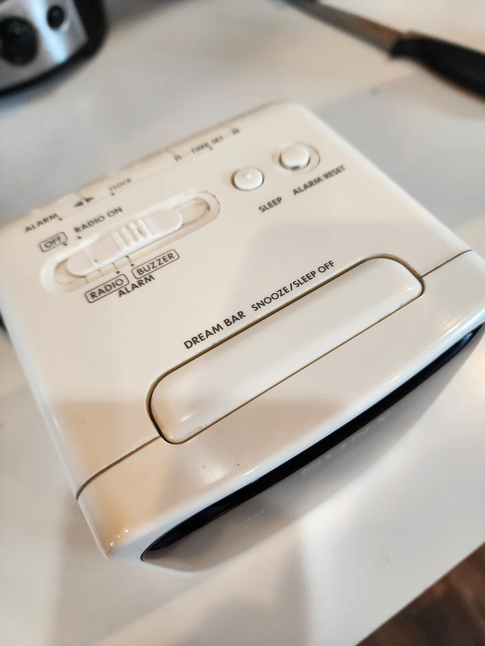 Vintage Sony White Clock Radio with Black Display and Green LEDs